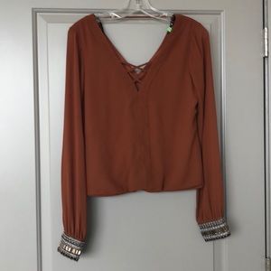 BKE boutique XS top with jeweled sleeves